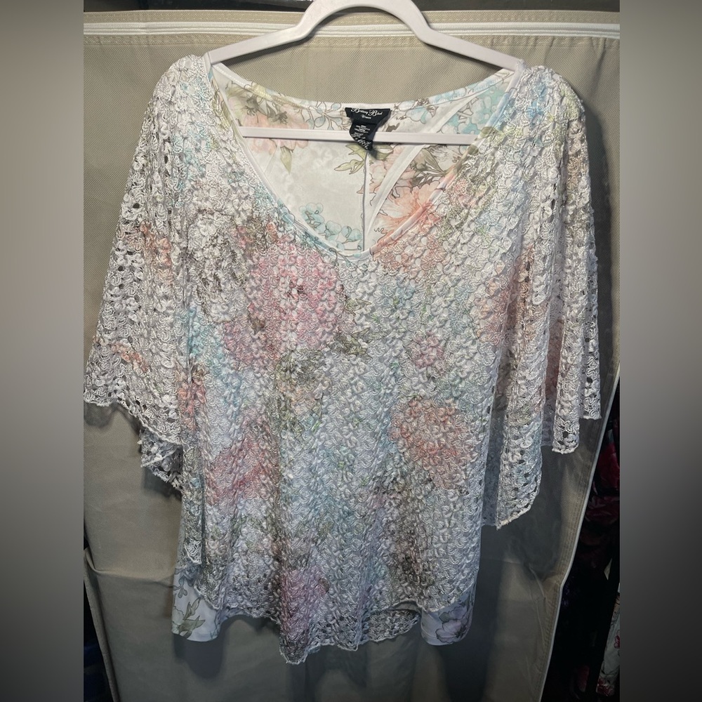 Brittany Black white floral design with lace cover.